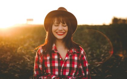 woman experiencing joy in an open field